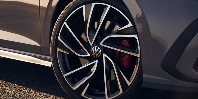 Close-up of a Volkswagen GTI alloy wheel rim.